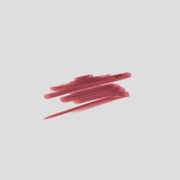 Swatch of Lip Definer No. 03 on grey backdrop — Victoria Beckham Beauty's berry pink-rose lip pencil texture.