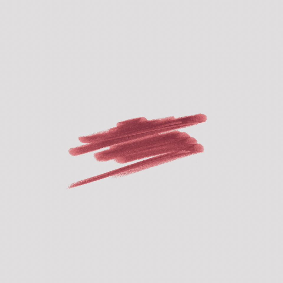 Swatch of Lip Definer No. 03 on grey backdrop — Victoria Beckham Beauty's berry pink-rose lip pencil texture.