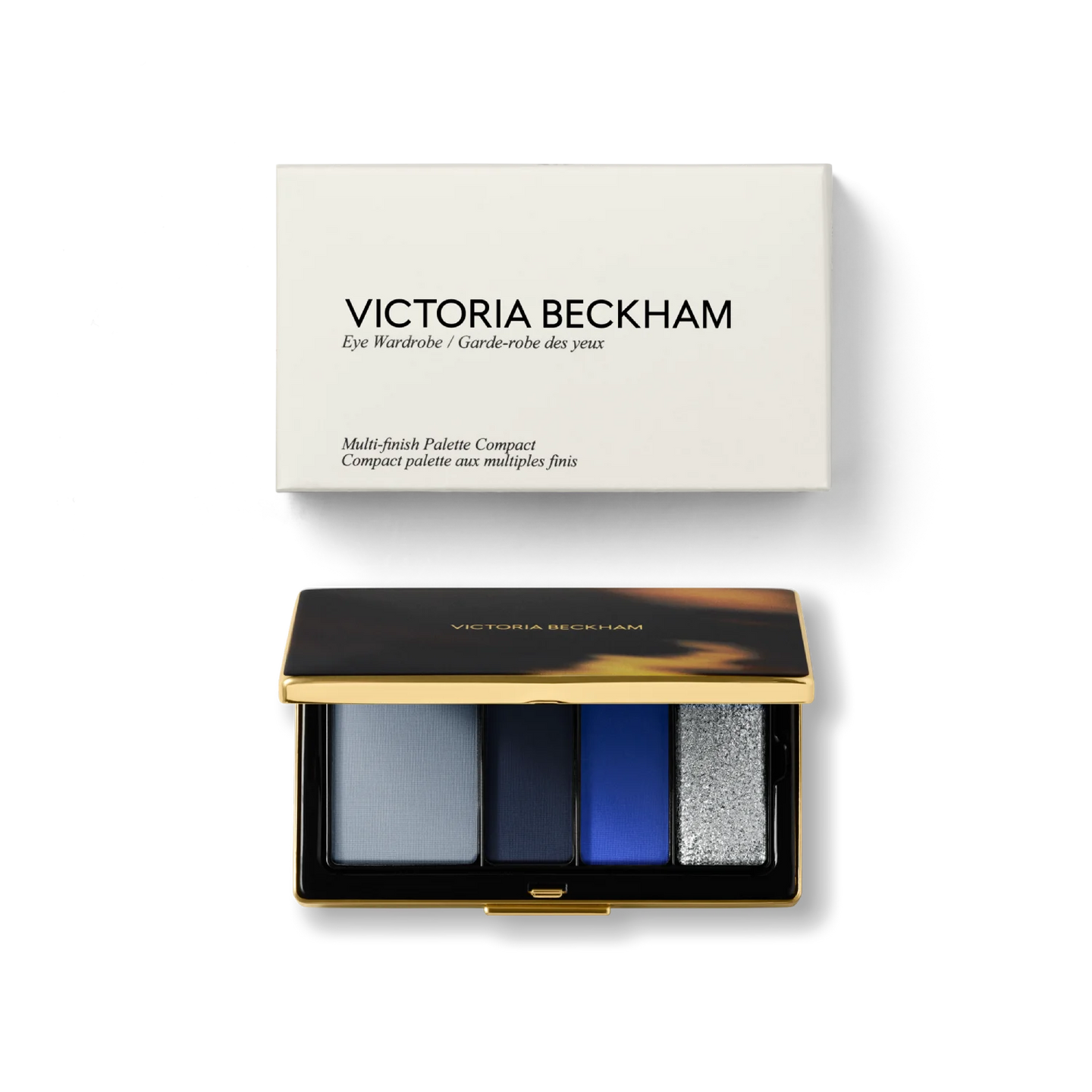 Victoria Beckham Beauty Eye Wardrobe in Navy Noir – luxury eyeshadow palette with elegant packaging, featuring four versatile shades in soft blue, deep navy, vibrant cobalt, and shimmering silver for a bold, statement eye look.
