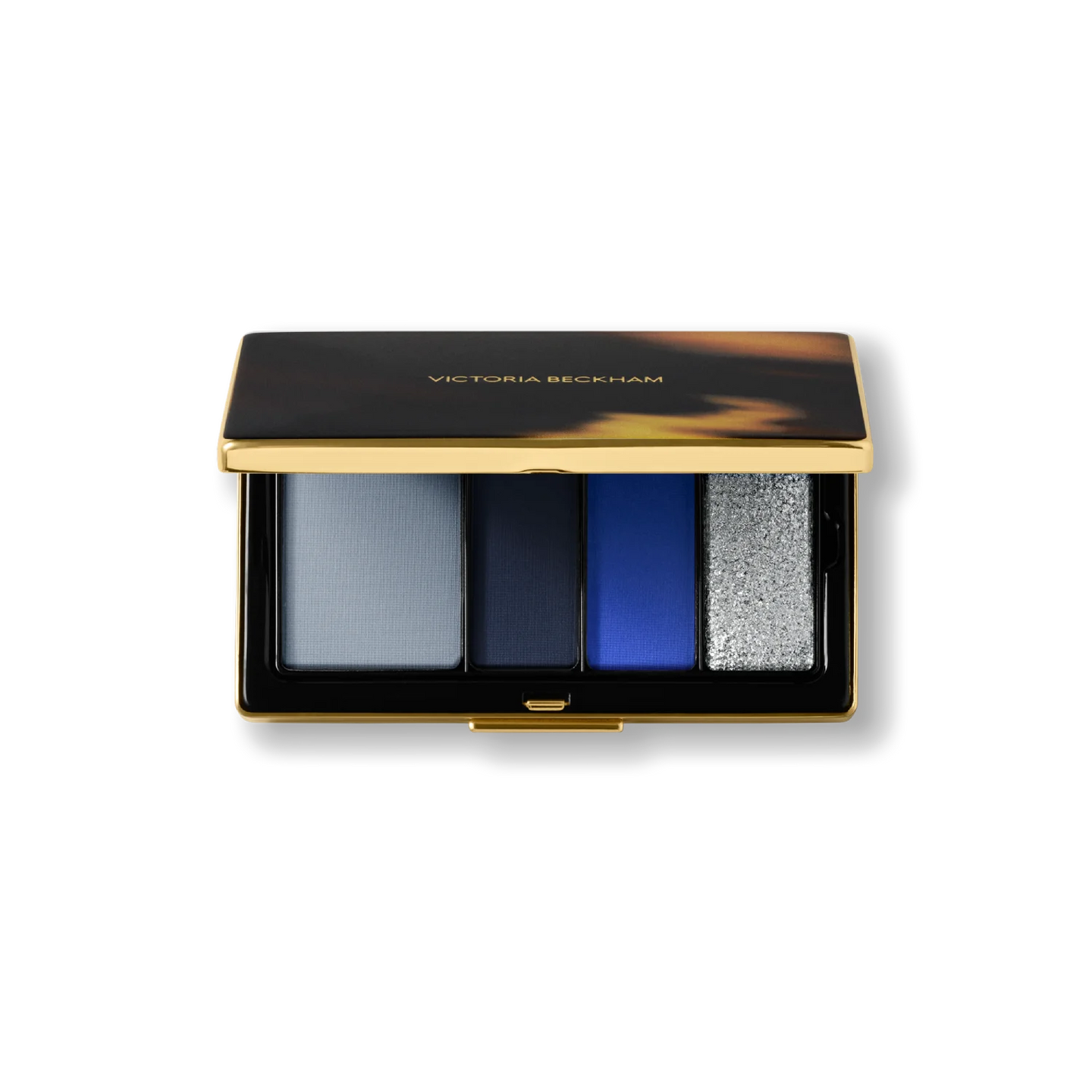 Victoria Beckham Beauty Eye Wardrobe in Navy Noir – luxury eyeshadow palette featuring four multi-finish shades in soft blue, deep navy, vibrant cobalt, and shimmering silver for a bold, modern eye look.