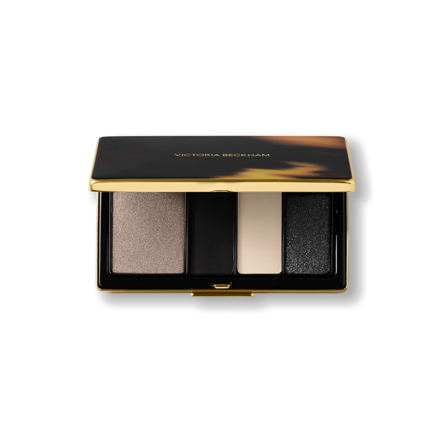 Victoria Beckham Beauty Eye Wardrobe in Night Flash – luxury eyeshadow palette featuring four multi-finish shades in shimmering taupe, deep matte black, soft ivory, and sparkling black for a bold, smoky eye look.