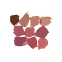 Grid of ten Posh Lip swatches from cocoa and nude to rose and berry on grey — Victoria Beckham Beauty lipstick shade range.