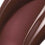 Posh Gloss TopDown swatch — Victoria Beckham Beauty's deep mahogany high-shine lip gloss, cropped close-up. swatch