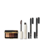 Eye Wardrobe in Cocoa, cocoa-tinted mascara and two Satin Kajal Liners on grey — Victoria Beckham Beauty Cocoa Eye Edit.