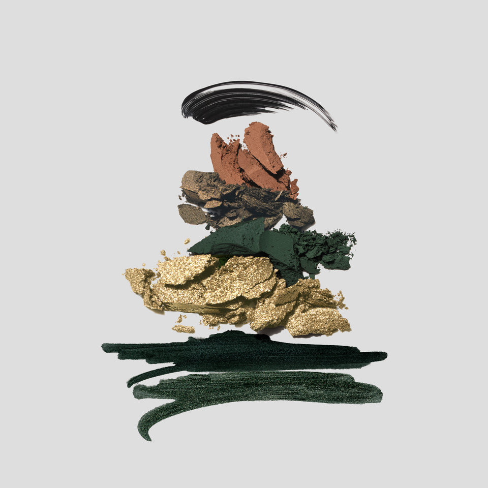 Crushed copper, khaki, forest green and gold shadows with green liner strokes — Victoria Beckham Beauty Olive Eye Kit textures.