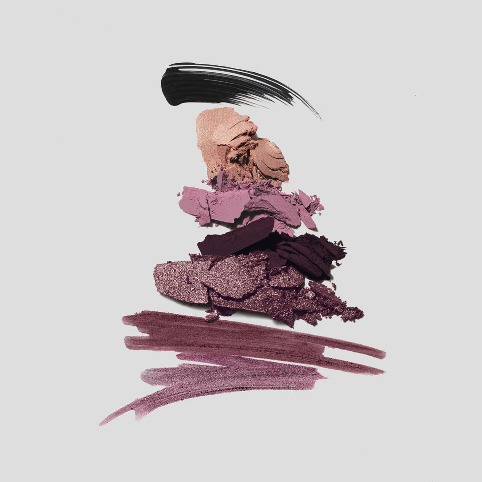 Crushed rose beige, mauve and plum shadows with mascara and liner strokes — Victoria Beckham Beauty Orchid Eye Kit textures.