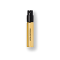 Small gold perfume bottle with black spray atomizer labeled "Hotel Portofino."