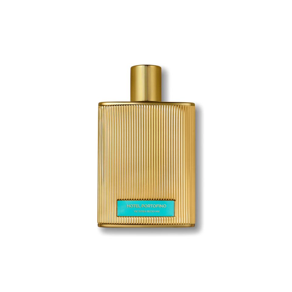 Fluted gold 50 mL Hotel Portofino bottle, capped, with a turquoise label — the fragrance by Victoria Beckham Beauty.