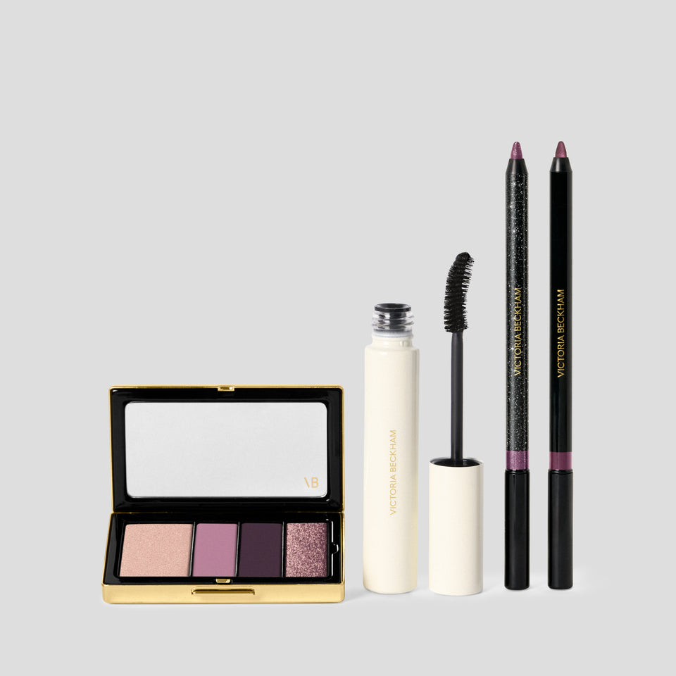Orchid Eye Kit laid out: pink and plum eyeshadow quad, mascara and two pencils — Victoria Beckham Beauty holiday set.