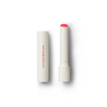 White cylindrical lip balm tube with red cap and Victoria Beckham branding text on side.