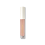 Closed Victoria Beckham Beauty Posh Gloss tube in Bikini — cream cap on a milky peach nude high-shine lip gloss.