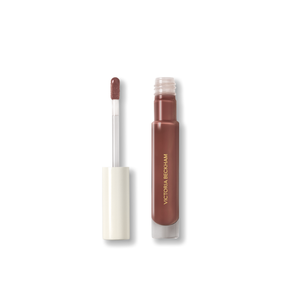 Open Victoria Beckham Beauty Posh Gloss in Poolside — cream cap and doe-foot wand reveal the cocoa brown gloss.