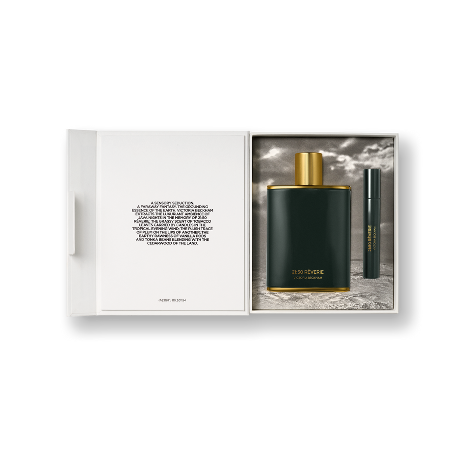 Perfume set with dark green bottle and gold cap in a box on a white background and black text about what inspired the scent.