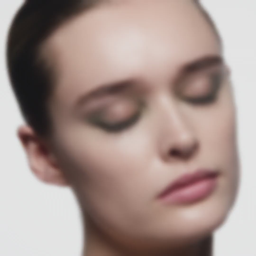 Model wearing Victoria Beckham Beauty Eye Wardrobe in Olive – video showcasing the rich green, gold, and bronze eyeshadow shades in motion for a luminous, smoky eye look.