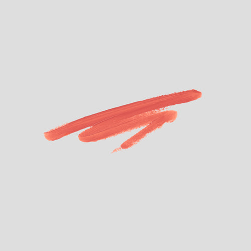 Brushstroke swatch of Blush Stylus Fresco on grey backdrop — Victoria Beckham Beauty creamy blush in coral peach.