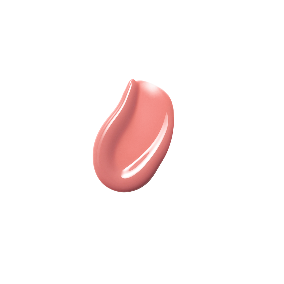 Glossy swatch of Posh Gloss Bungalow — Victoria Beckham Beauty's warm coral peach lip gloss with mirror-finish shine.
