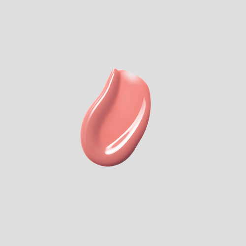 Glossy swatch of Posh Gloss Bungalow on grey backdrop — Victoria Beckham Beauty's warm coral peach high-shine lip gloss.