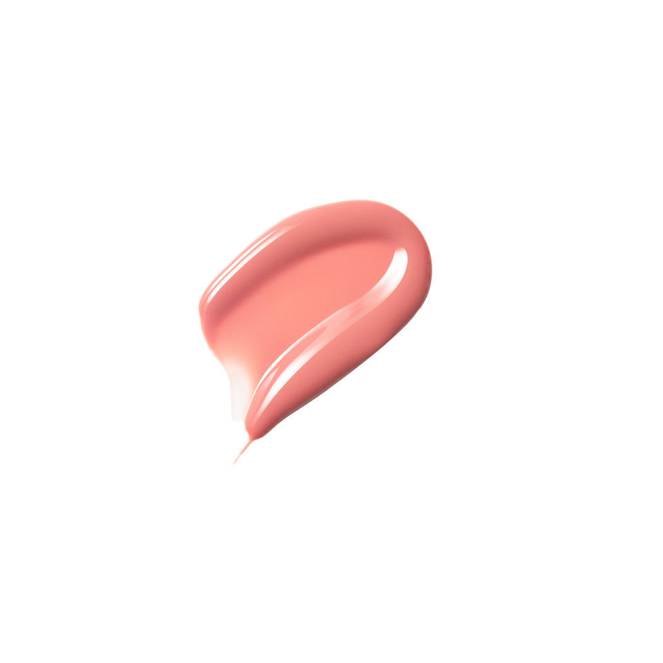 Glossy swatch of Posh Gloss Picante — Victoria Beckham Beauty's vivid coral salmon lip gloss with mirror-finish shine.